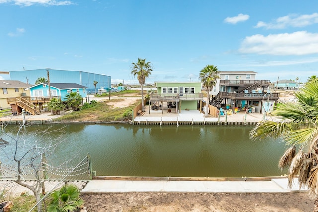 property view of water featuring stairs