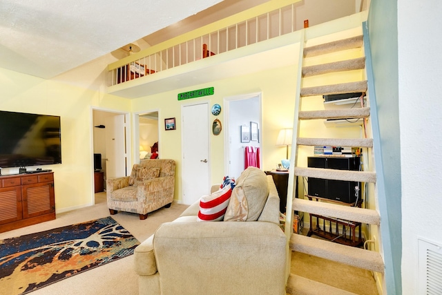 living area with carpet floors and baseboards