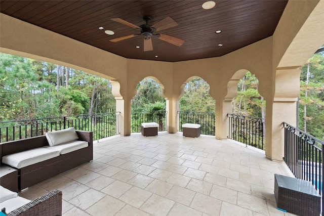 view of patio with ceiling fan and an outdoor hangout area