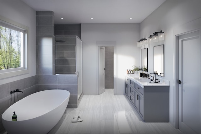 bathroom with vanity with extensive cabinet space, tile walls, tile flooring, dual sinks, and independent shower and bath