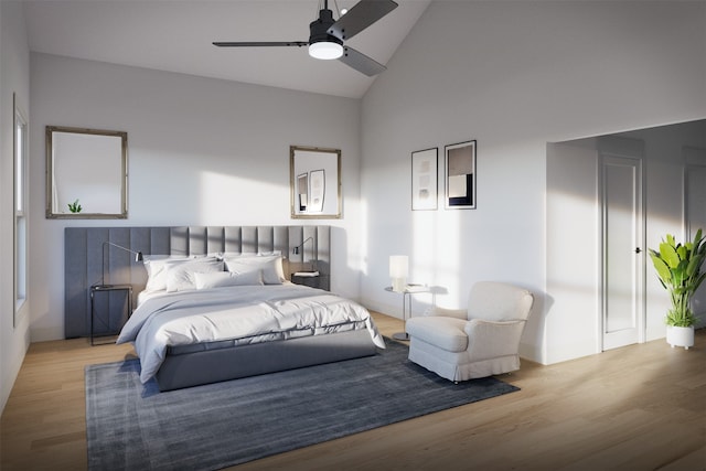 bedroom featuring high vaulted ceiling, ceiling fan, and light wood-type flooring