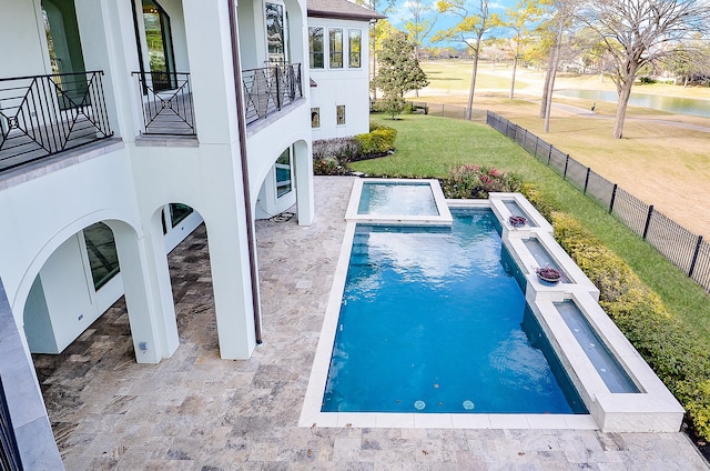 view of pool featuring a yard