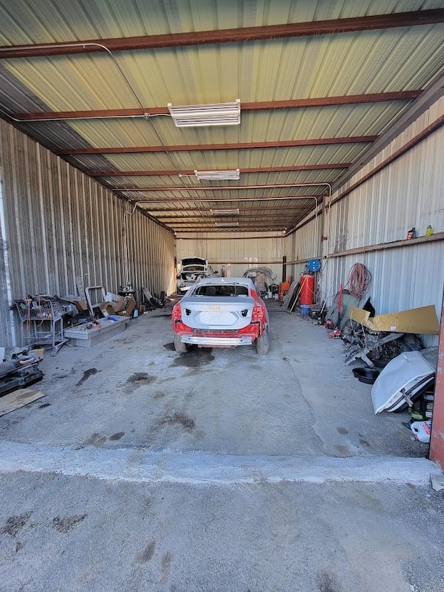 garage featuring a carport