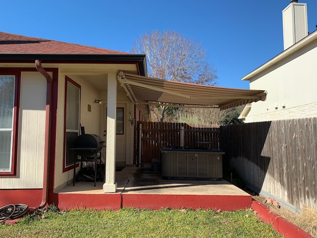 view of yard with central air condition unit and a patio