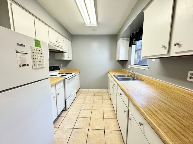 kitchen with white appliances, white cabinetry, sink, and light tile floors