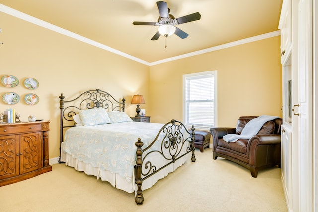 bedroom featuring light carpet, crown molding, and ceiling fan