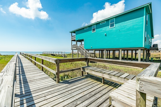 deck featuring a water view