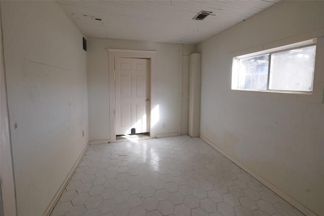 empty room featuring tile patterned flooring