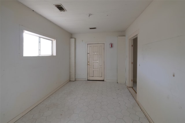 view of tiled spare room