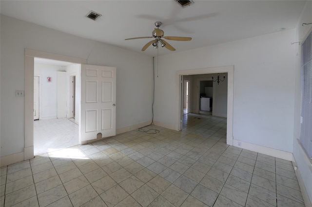 unfurnished room with light tile patterned flooring and ceiling fan