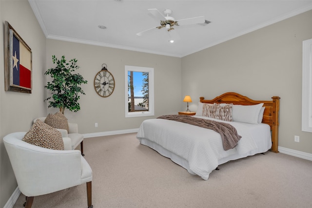 bedroom featuring carpet floors, ceiling fan, and crown molding