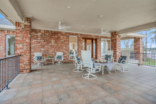 view of patio / terrace featuring ceiling fan