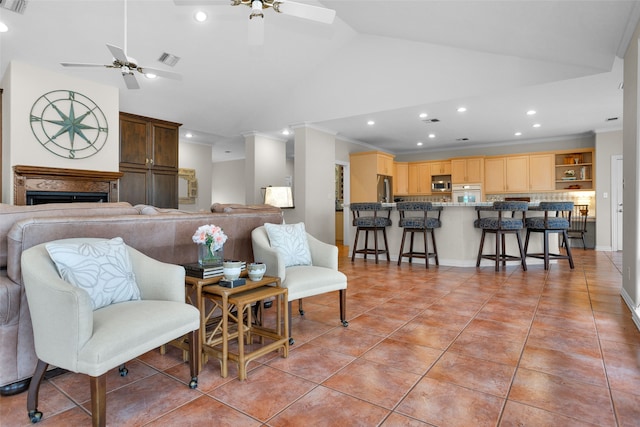 tiled living room featuring ornamental molding, high vaulted ceiling, and ceiling fan