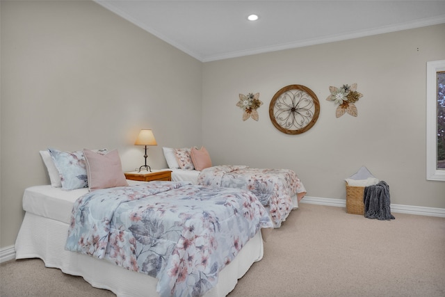 bedroom with crown molding and carpet floors