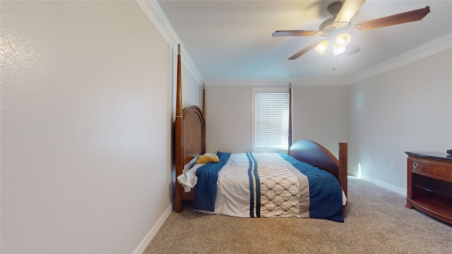 carpeted bedroom featuring ornamental molding and ceiling fan