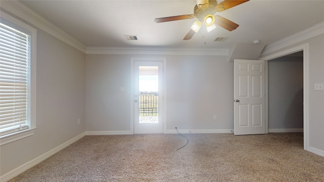 unfurnished room with light carpet, ornamental molding, and ceiling fan