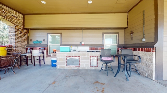 view of patio featuring a wet bar