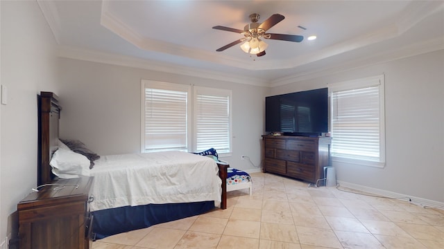 tiled bedroom featuring a tray ceiling, ceiling fan, and ornamental molding