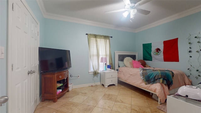 tiled bedroom with a closet, crown molding, and ceiling fan