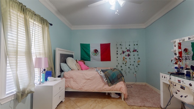 tiled bedroom with multiple windows, ornamental molding, and ceiling fan