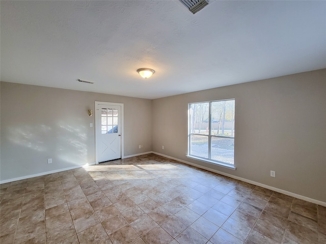 view of tiled empty room