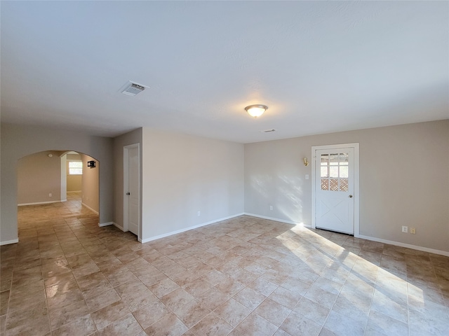 empty room with light tile flooring