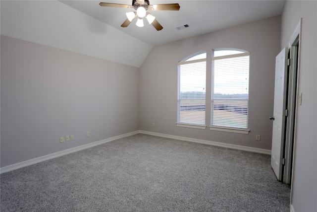 additional living space featuring lofted ceiling, carpet floors, and ceiling fan