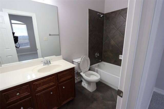 full bathroom with vanity, tile patterned flooring, tiled shower / bath combo, and toilet