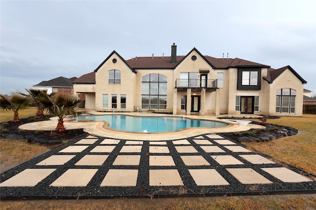 pool with a patio