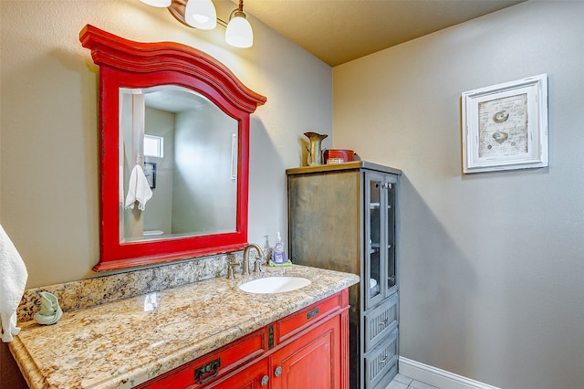 bathroom with tile flooring and large vanity