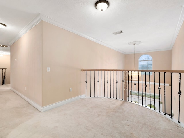 hall featuring light carpet and crown molding