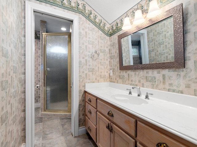 bathroom with tile floors, large vanity, and a shower with shower door