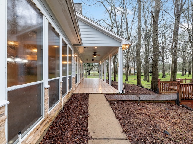 view of yard with ceiling fan