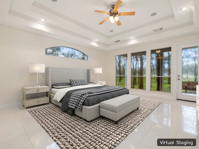 tiled bedroom with a tray ceiling, access to outside, and ceiling fan