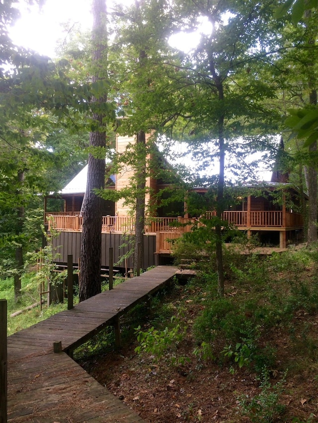 view of yard featuring a wooden deck