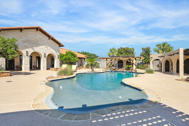 view of swimming pool with a patio