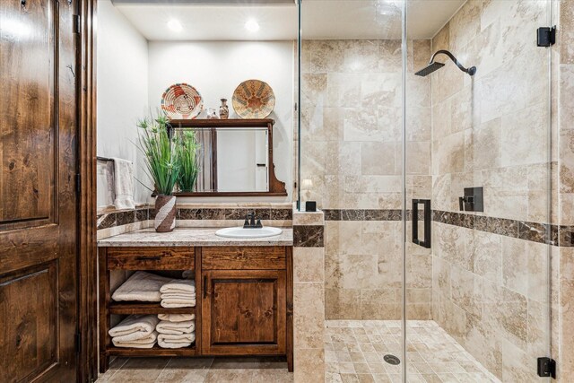 bathroom featuring vanity and walk in shower