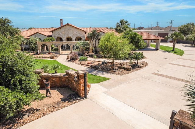 view of front of property with a gazebo