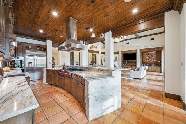 kitchen featuring a large island, wooden ceiling, island exhaust hood, a fireplace, and appliances with stainless steel finishes