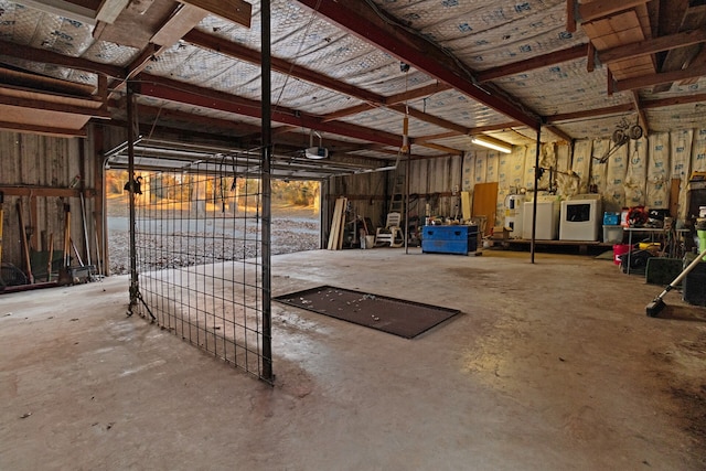 garage featuring washing machine and dryer