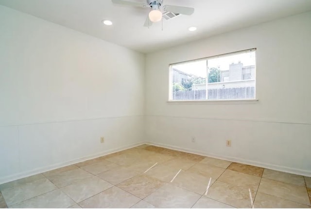 unfurnished room featuring ceiling fan