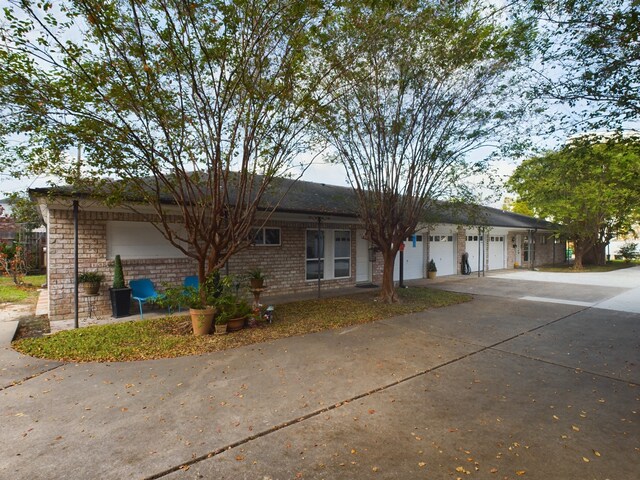 single story home featuring a garage