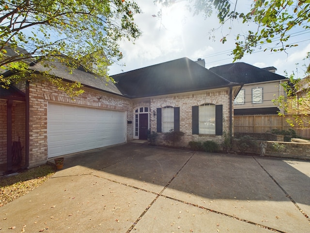 view of front of home with a garage