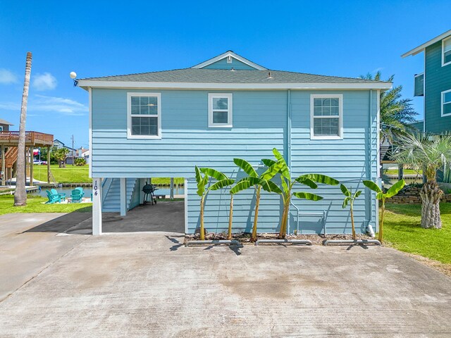 exterior space featuring a carport