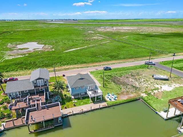 bird's eye view featuring a water view and a rural view