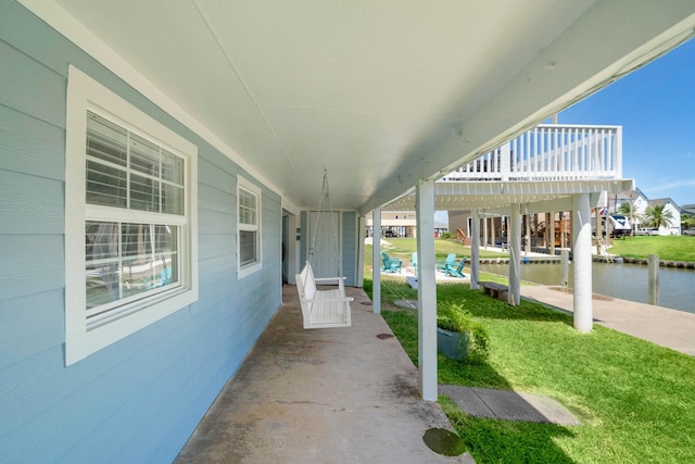 view of patio / terrace featuring a water view