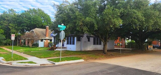 view of front of home with a front yard