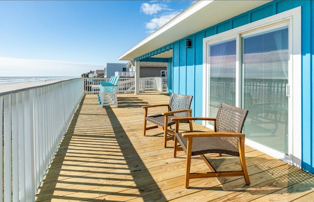 wooden balcony featuring a deck