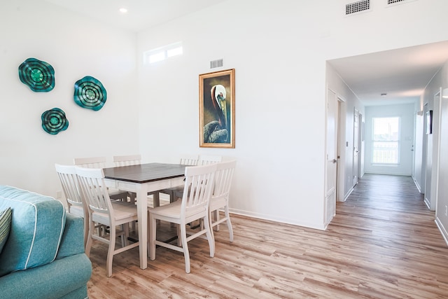 dining room featuring light hardwood / wood-style flooring