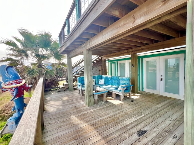 deck featuring french doors and an outdoor hangout area